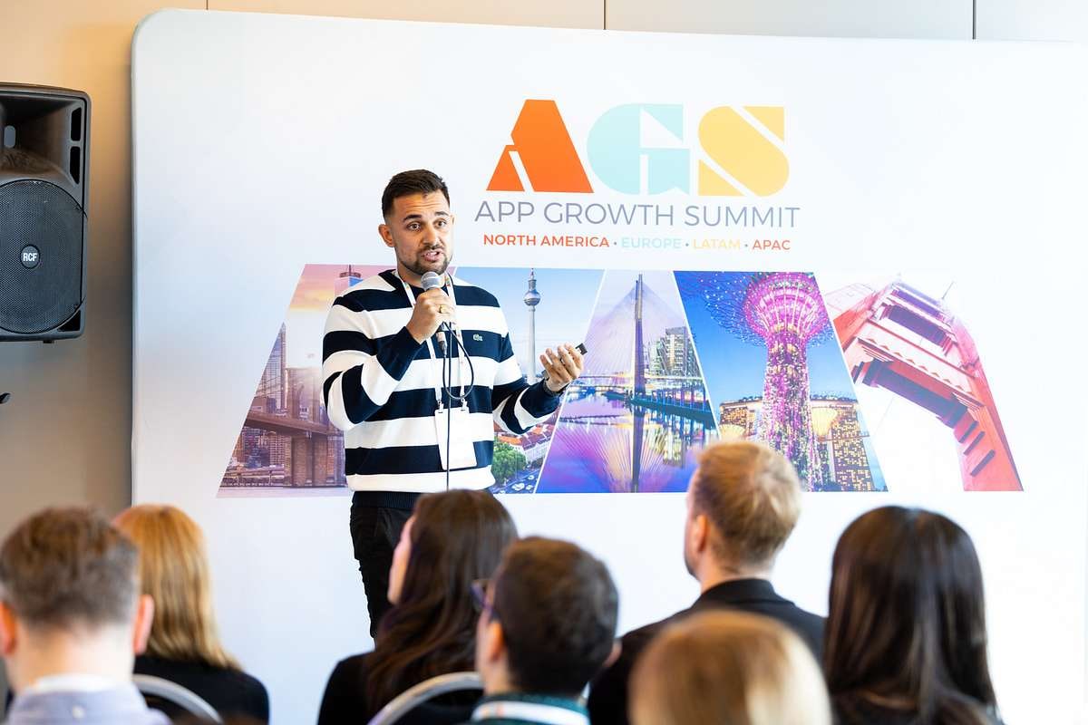 Kevin Dosanjh delivering a presentation on TikTok strategies at the App Growth Summit Berlin 2023, engaging the audience from the stage